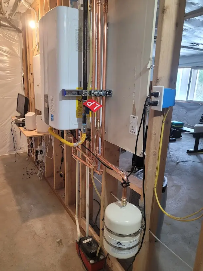 Licensed plumber repairing a kitchen sink in Naples