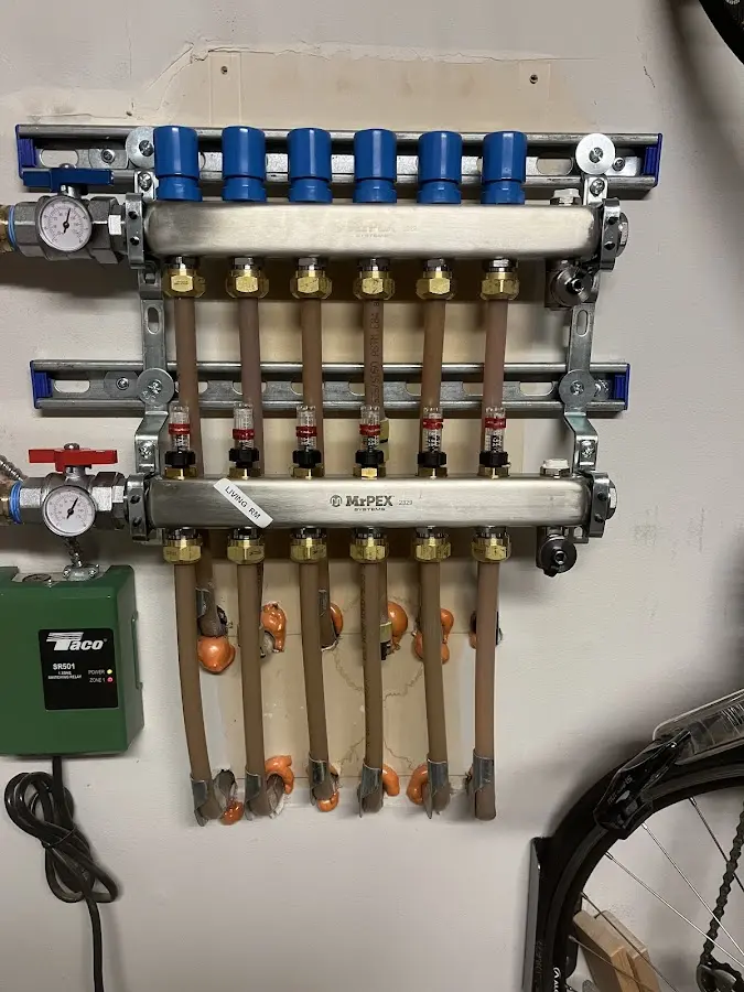 Plumber performing Water Heater Repair at a residential property in Naples